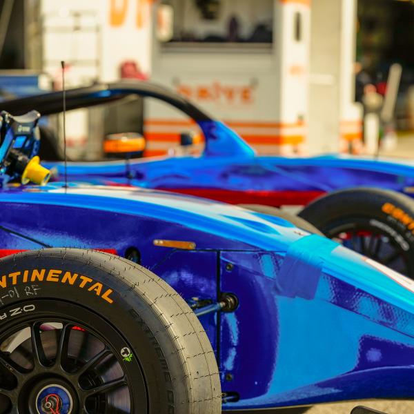 USF cars in paddock
