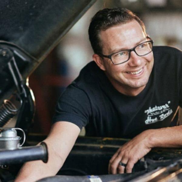 Emily Reeves' husband working on a truck